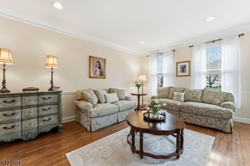 26 Rouser Way Hillsborough, NJ 08844 - Photo 7 of 49 a living room with furniture a wooden floor and a window