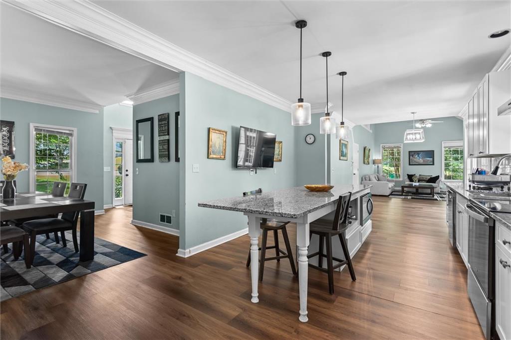 3183 Robinwood Trail Decatur, GA 30034 - Photo 14 of 61 a view of a dining room with furniture window and wooden floor