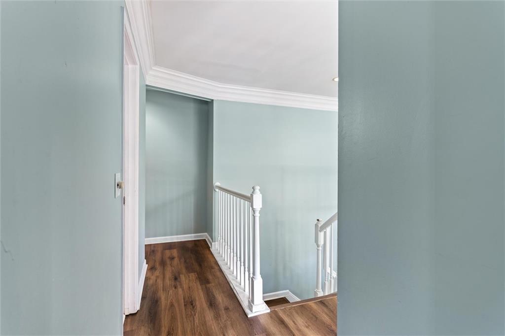 3183 Robinwood Trail Decatur, GA 30034 - Photo 32 of 61 a view of a hallway with wooden floor