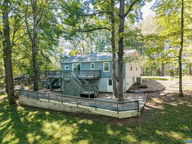 a view of a house with swimming pool