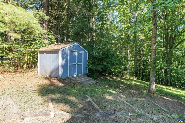 a backyard of a house with lots of green space