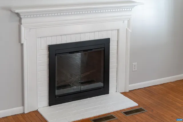 a living room with a fireplace