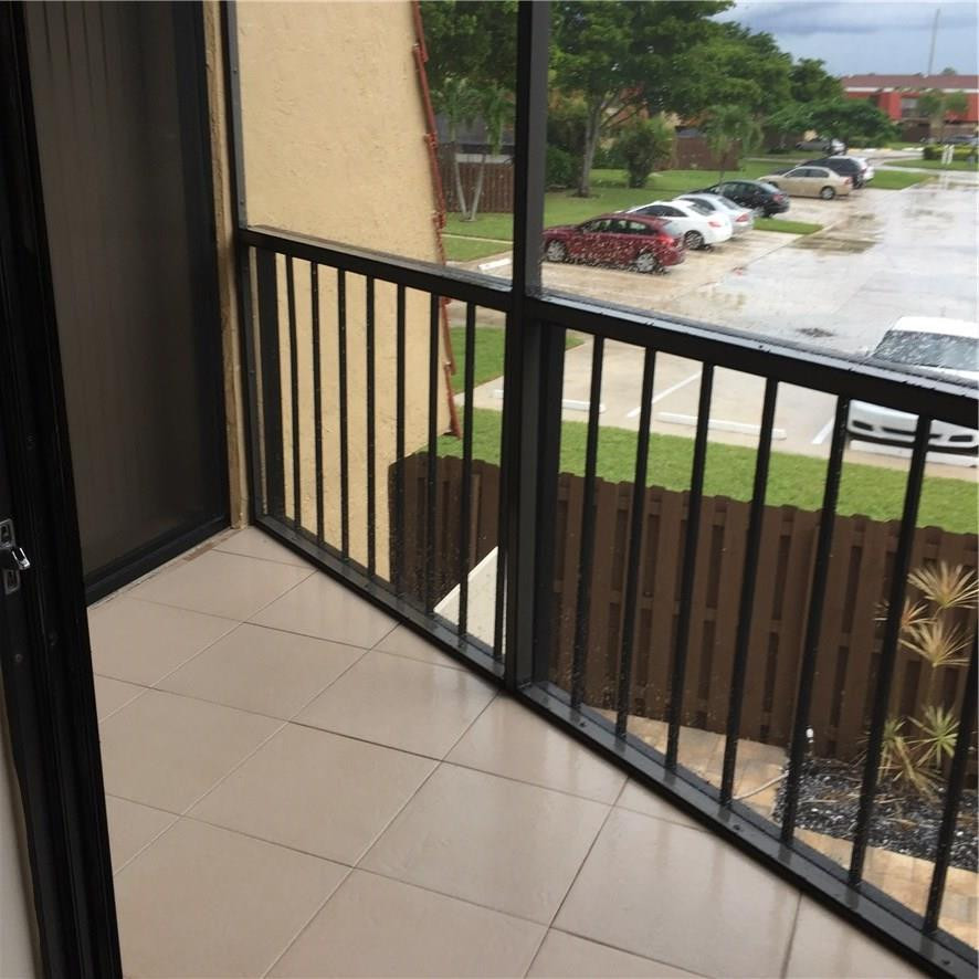 8328 Trent Court, Unit B Boca Raton, FL 33433 - Photo 20 of 22 Screened Upstairs Balcony
