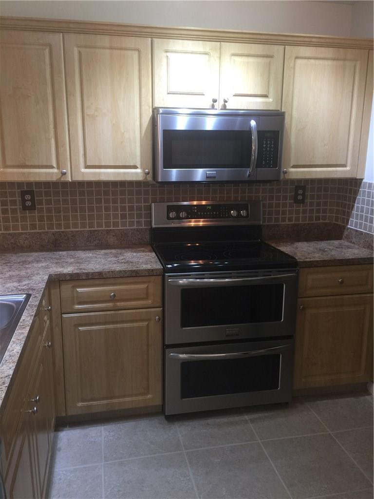 8328 Trent Court, Unit B Boca Raton, FL 33433 - Photo 10 of 22 Upgraded Kitchen with Double Oven