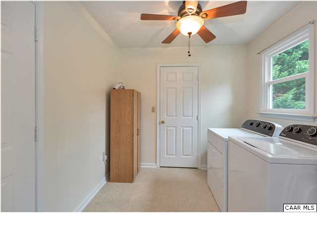 6 Spring Oaks Lane Ruckersville, VA 22968 - Photo 15 of 27 a room with a ceiling fan and a window