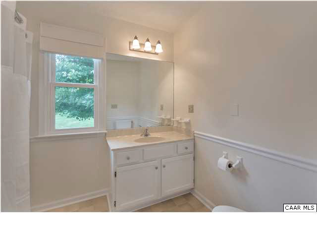 6 Spring Oaks Lane Ruckersville, VA 22968 - Photo 19 of 27 a bathroom with a sink and a mirror