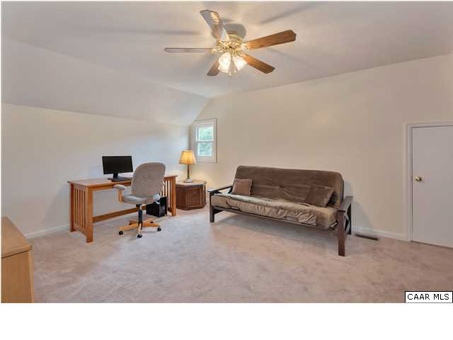6 Spring Oaks Lane Ruckersville, VA 22968 - Photo 21 of 27 a living room with furniture and a rug