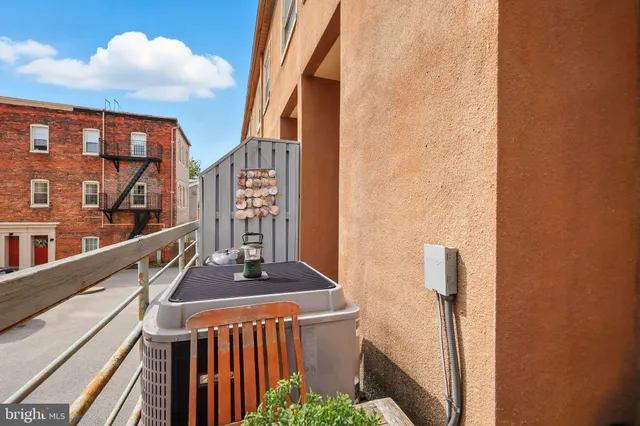 a view of a room with toys and wooden floor