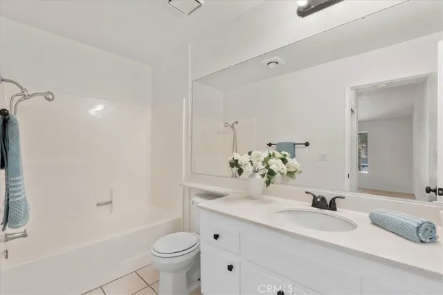 a bathroom with a toilet and a sink