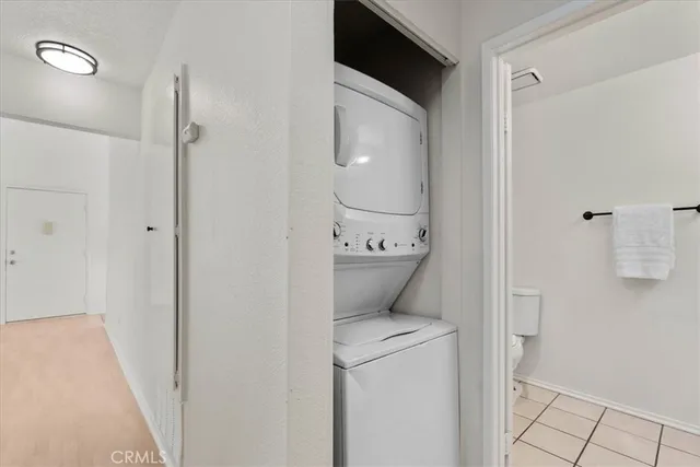 a bathroom with a double vanity sink mirror and shower