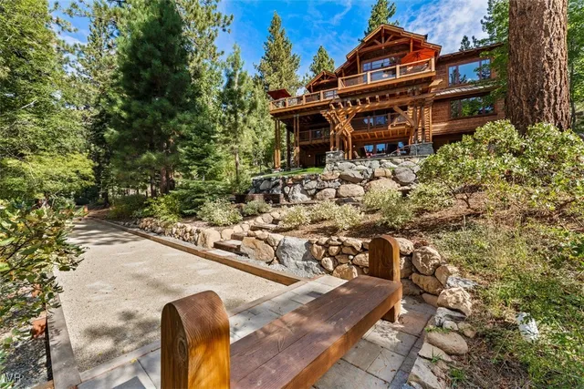a view of a balcony with wooden floor