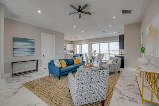 a living room with furniture and a rug