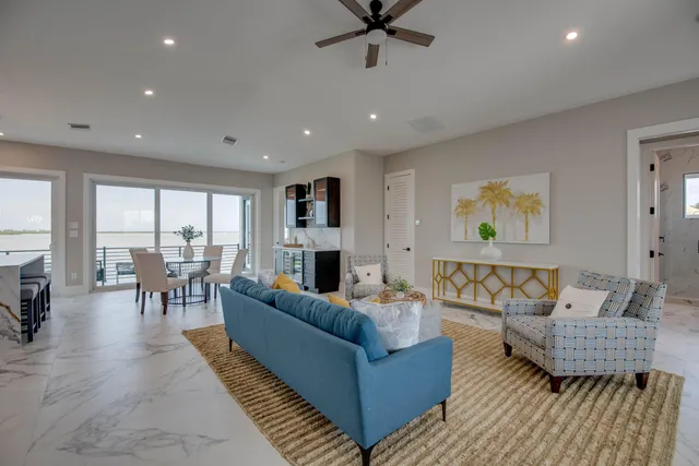 a living room with furniture and a table