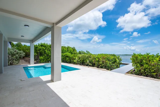 a view of a garden with a fountain