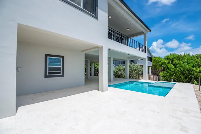 a view of a house with a swimming pool