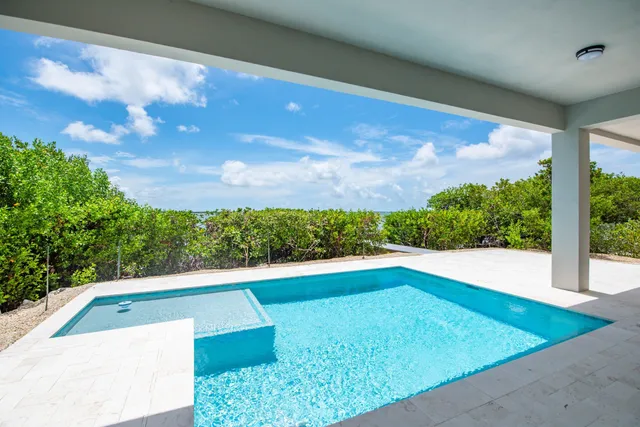 a view of an outdoor space and swimming pool