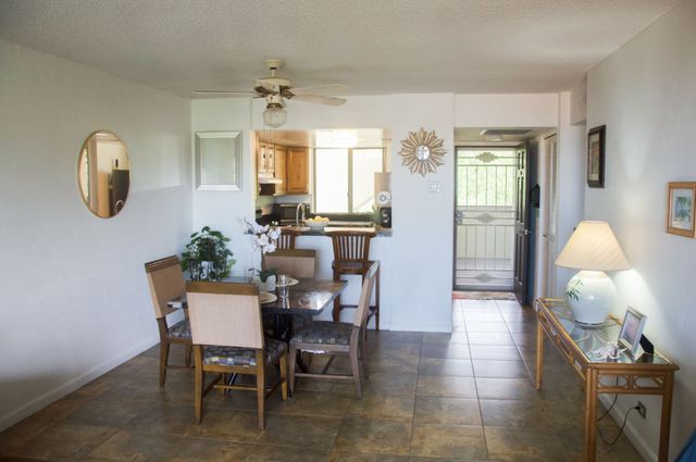a kitchen with a sink and a window