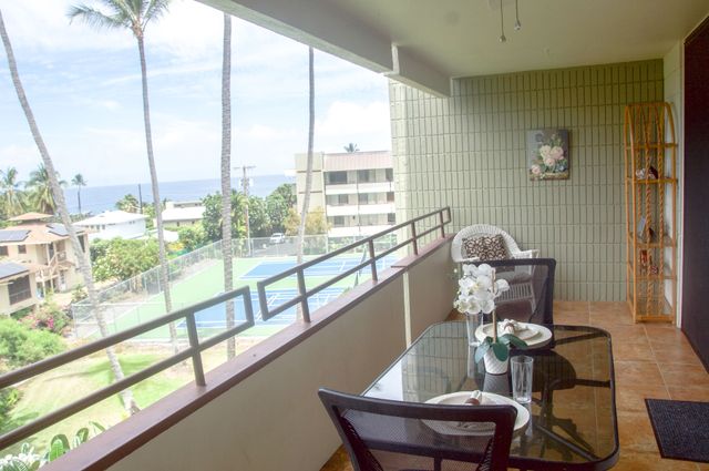 a view of a bathroom from a hallway