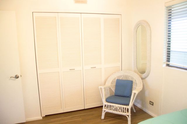 a view of a tall white building