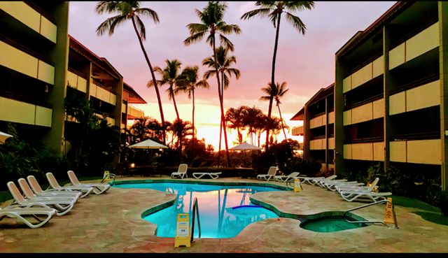 a view of a house with swimming pool