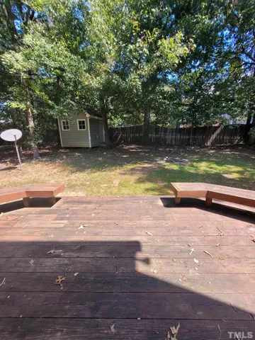 a view of a two chairs on the roof deck