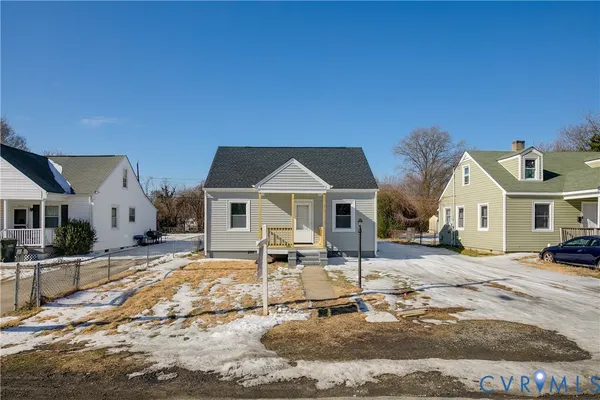 a house with trees in the background