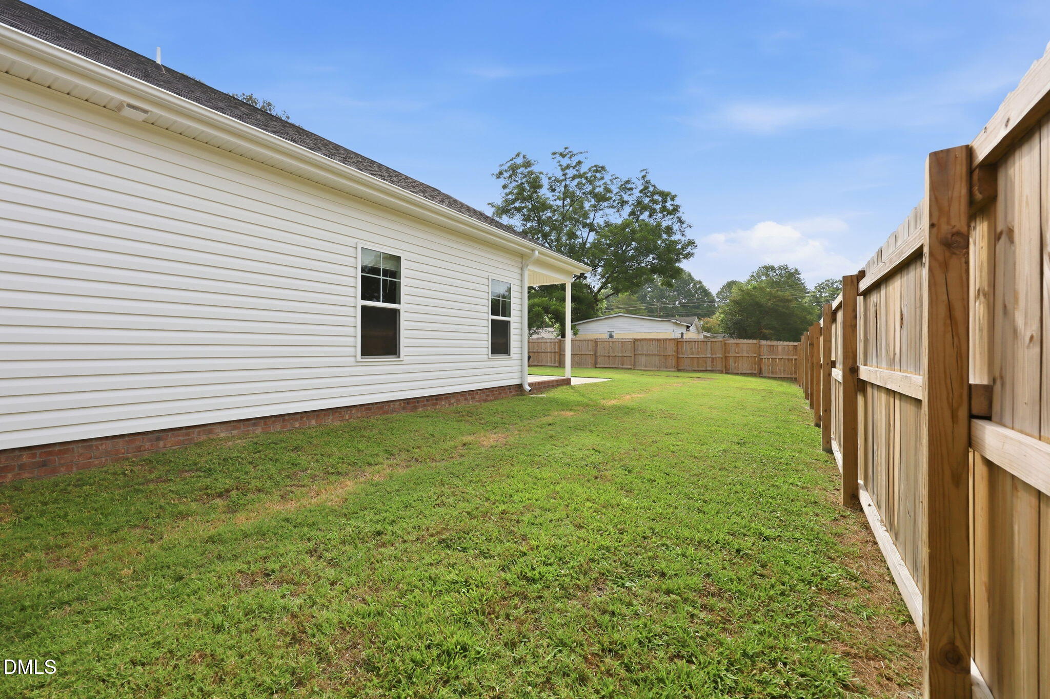 709 South Pollock Street Selma, NC 27576 - Photo 24 of 30 a view of backyard with garden