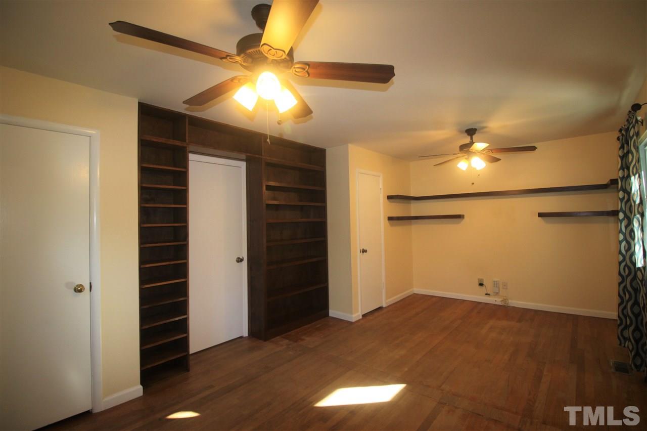 1409 Kelly Road Garner, NC 27529 - Photo 11 of 20 a view of empty room with a ceiling fan