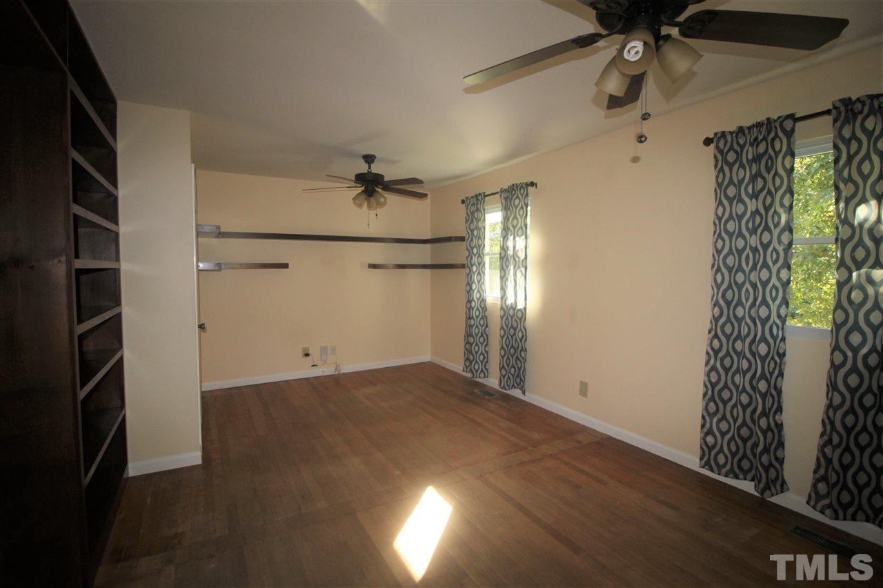 1409 Kelly Road Garner, NC 27529 - Photo 12 of 20 wooden floor in an empty room