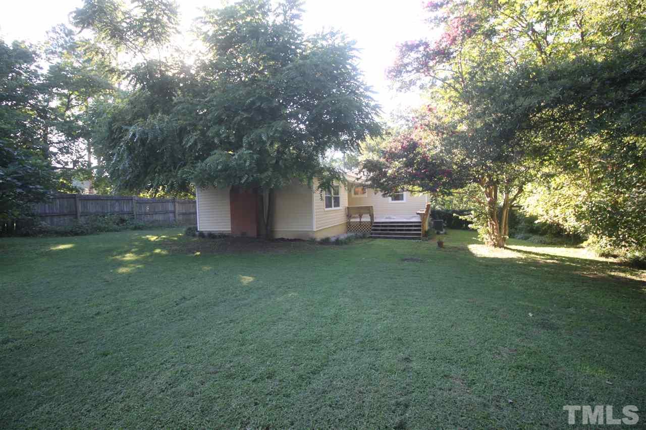 1409 Kelly Road Garner, NC 27529 - Photo 13 of 20 a view of a house with a yard