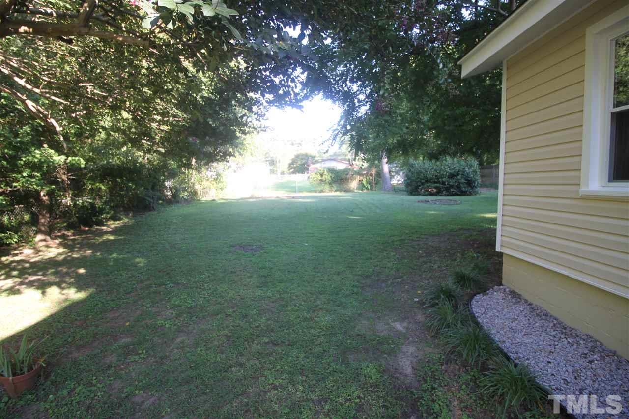 1409 Kelly Road Garner, NC 27529 - Photo 16 of 20 a view of backyard with green space