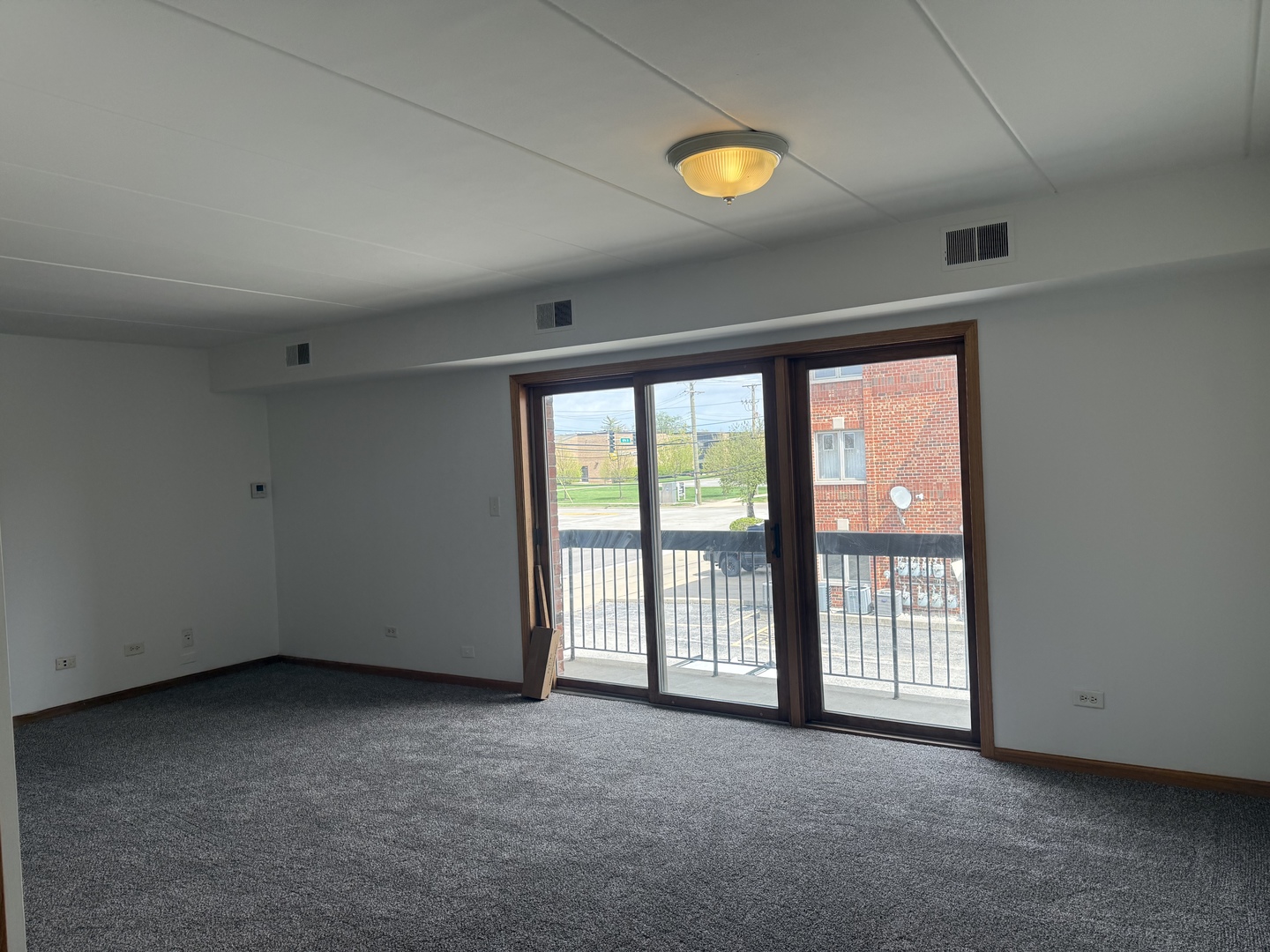 5627 107th Street, Unit 2E Chicago Ridge, IL 60415 - Photo 9 of 9 a view of a room with window