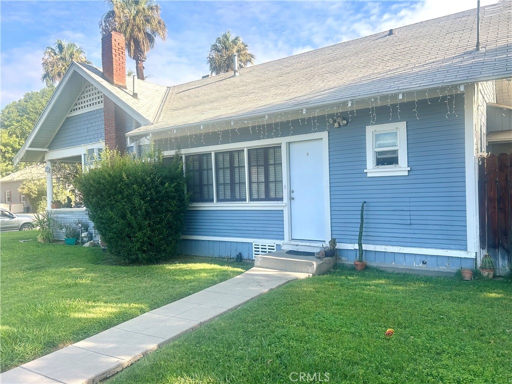 4096 Pine Street Riverside, CA 92501 - Photo 2 of 10 a view of a house with a yard