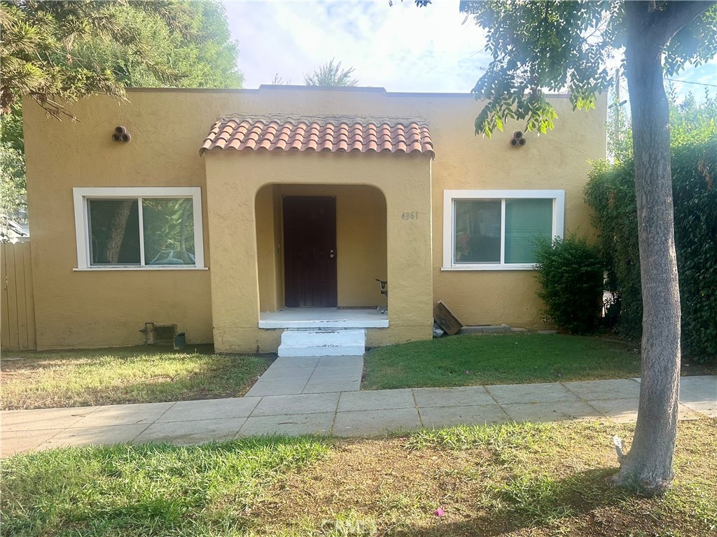 4096 Pine Street Riverside, CA 92501 - Photo 5 of 10 a front view of a house with garden