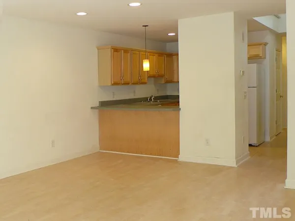 a view of a kitchen with a sink
