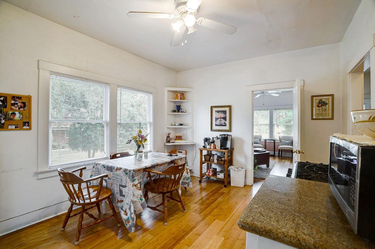 5885 Monterey Frontage Road, Unit A Gilroy, CA 95020 - Photo 11 of 49 a view of a dining room with furniture window and wooden floor