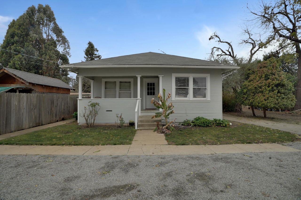 5885 Monterey Frontage Road, Unit A Gilroy, CA 95020 - Photo 2 of 49 a front view of a house with a yard and garage
