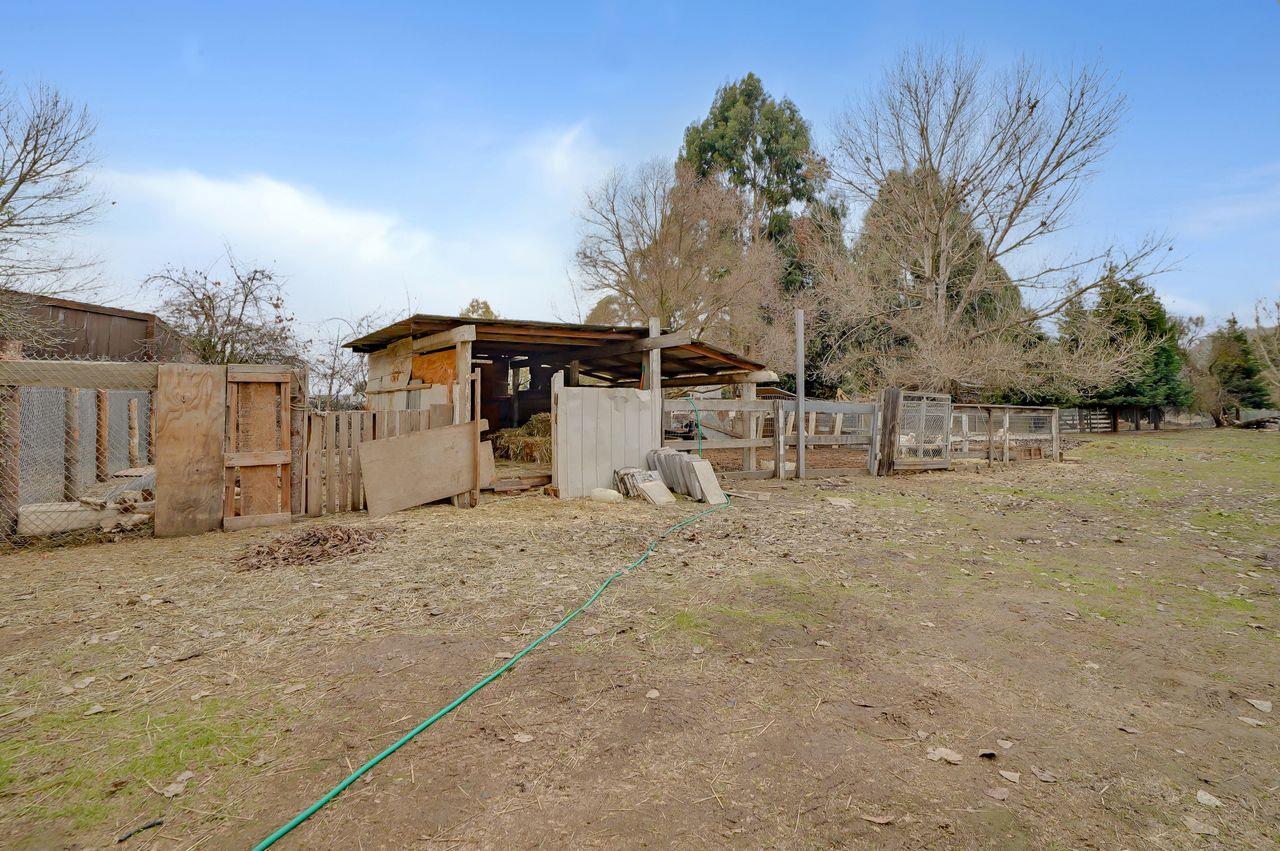 5885 Monterey Frontage Road, Unit A Gilroy, CA 95020 - Photo 36 of 49 a view of a dirt road with a building in the background