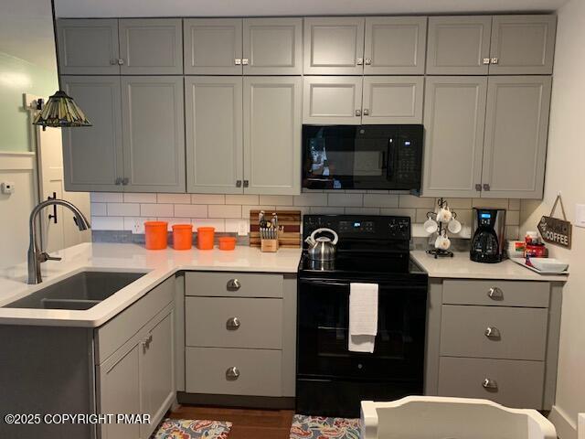 1164 Upper Seese Hill Road Canadensis, PA 18325 - Photo 4 of 12 a kitchen with a sink and cabinets
