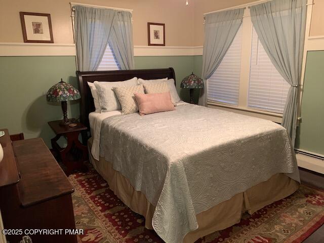1164 Upper Seese Hill Road Canadensis, PA 18325 - Photo 6 of 12 a bed sitting in a bedroom next to a window