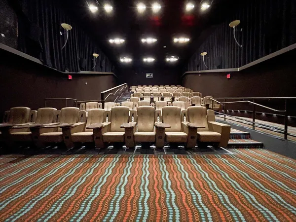 a view of a hallway with wooden shelves