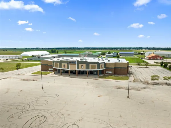 a view of a swimming pool and a lounge chair