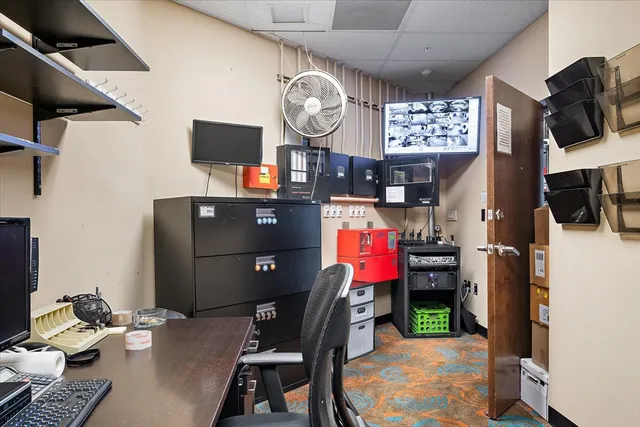 a view of a workspace with furniture