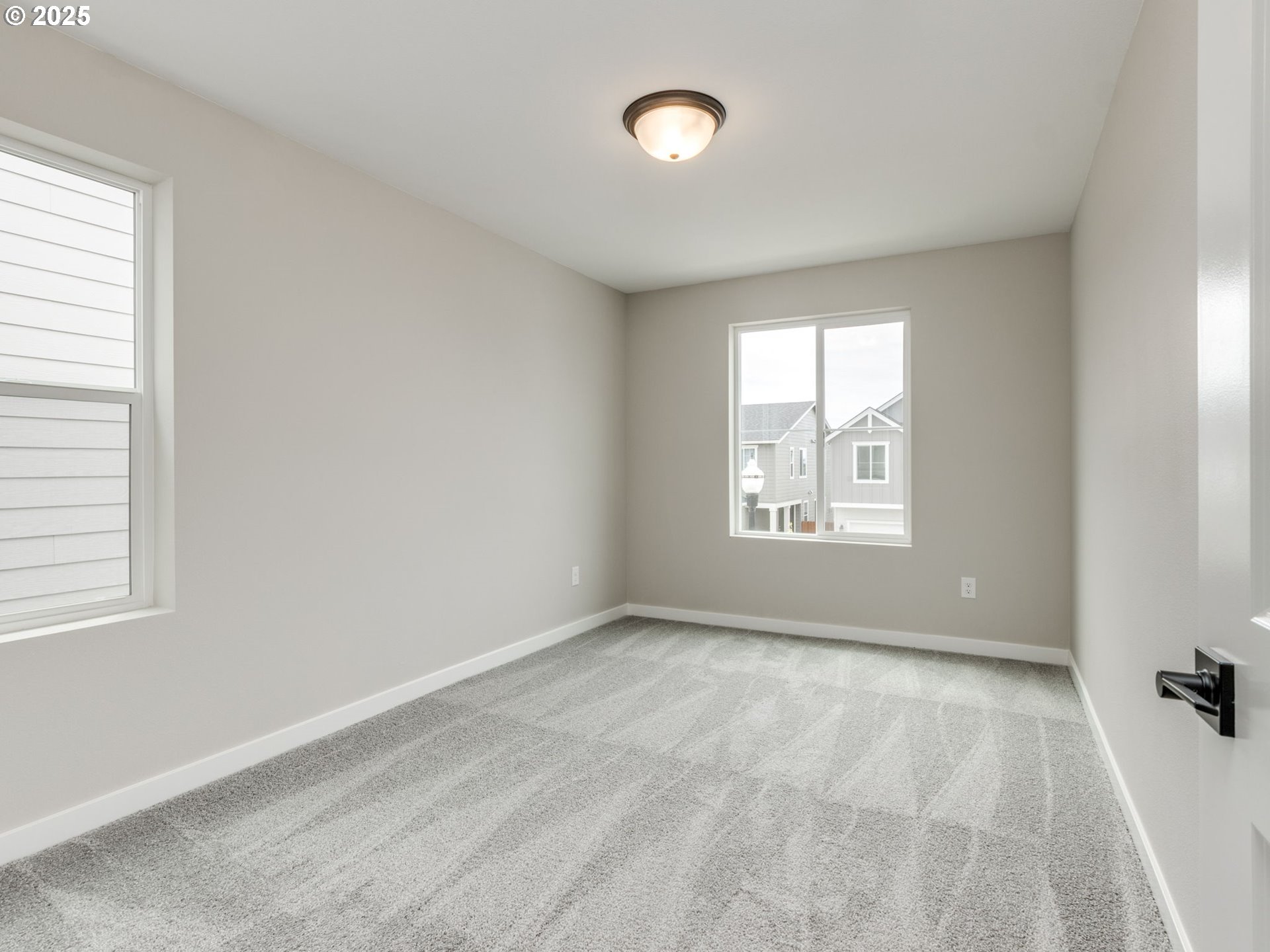 838 Northwest 178th Street Ridgefield, WA 98642 - Photo 18 of 33 an empty room with windows