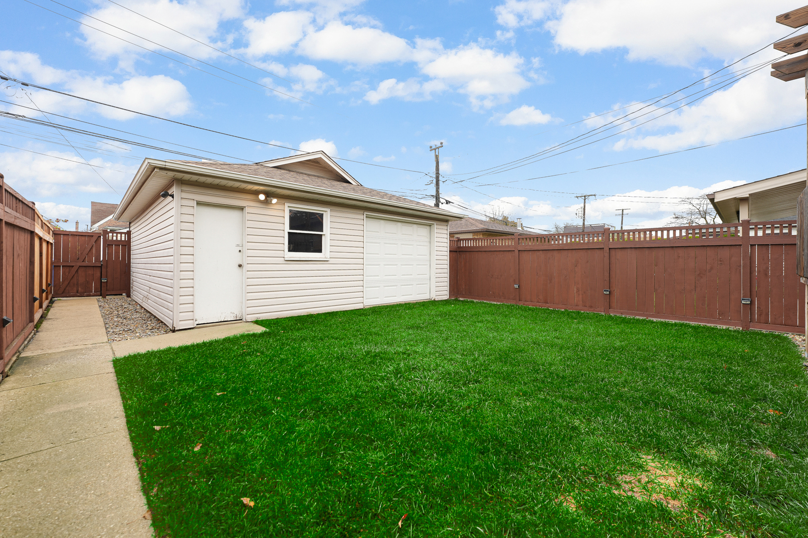 5416 South Rutherford Avenue Chicago, IL 60638 - Photo 25 of 25 a view of a backyard with a garden