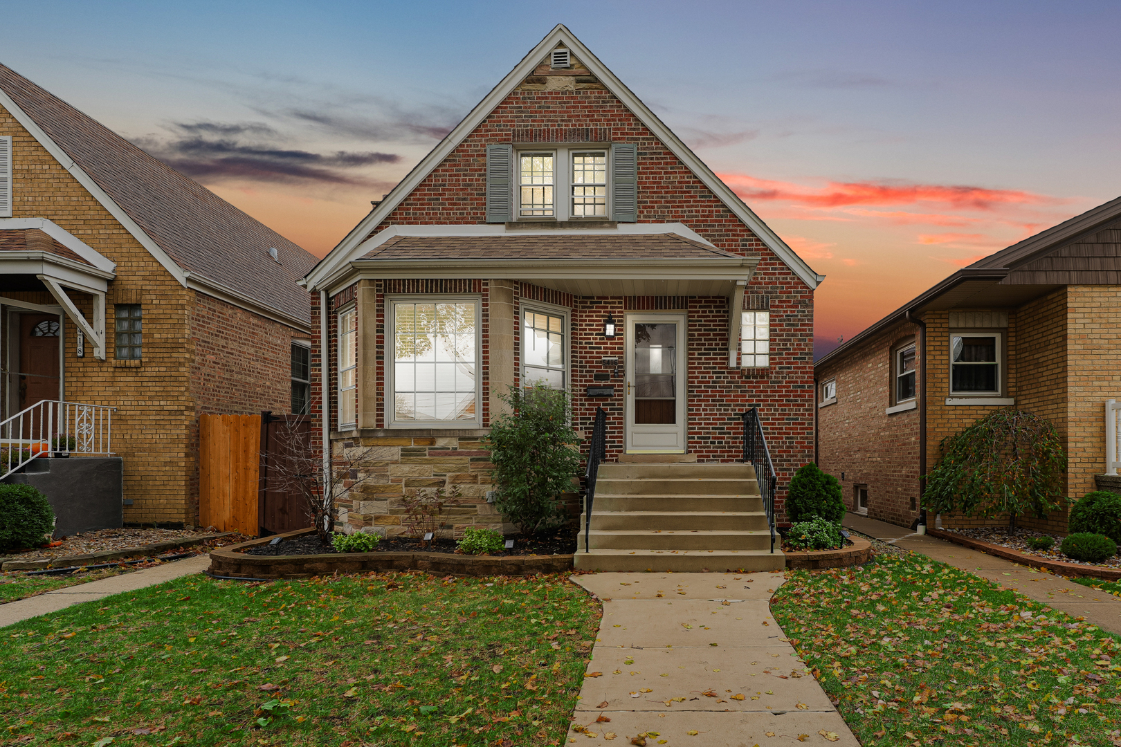 5416 South Rutherford Avenue Chicago, IL 60638 - Photo 4 of 25 a front view of a house with garden