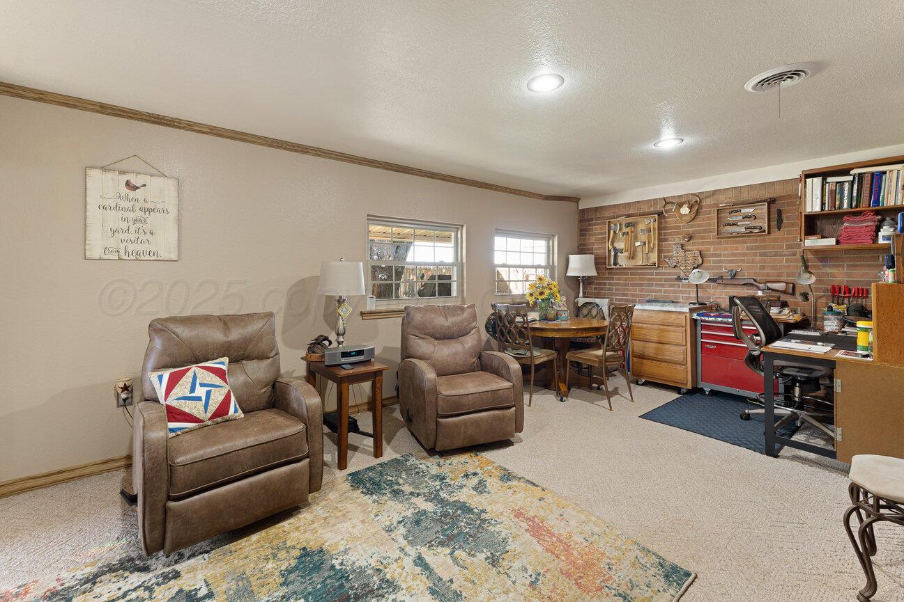 148 Buffalo Trail Fritch, TX 79036 - Photo 22 of 81 a living room with furniture and a window