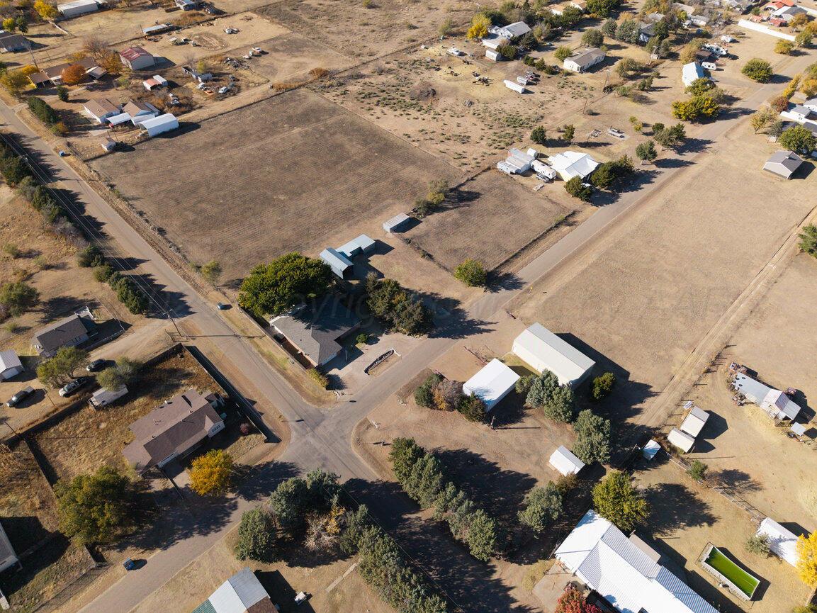 148 Buffalo Trail Fritch, TX 79036 - Photo 51 of 81 an aerial view of multiple houses with yard