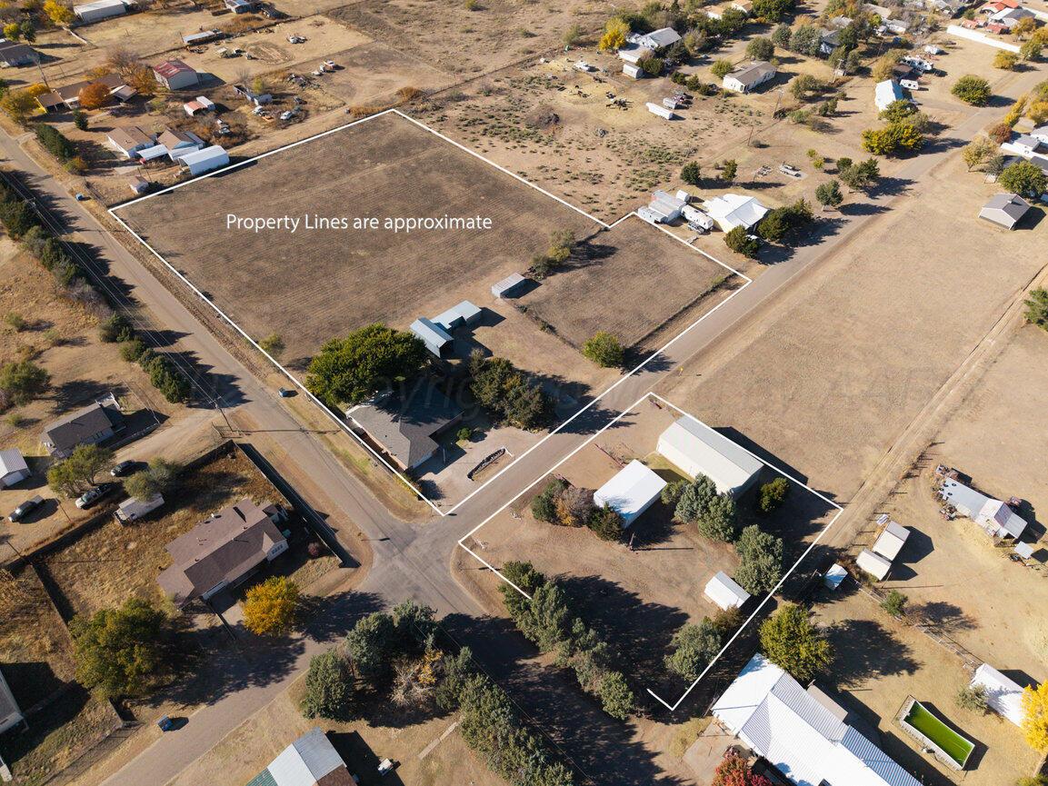 148 Buffalo Trail Fritch, TX 79036 - Photo 52 of 81 an aerial view of multiple houses with yard