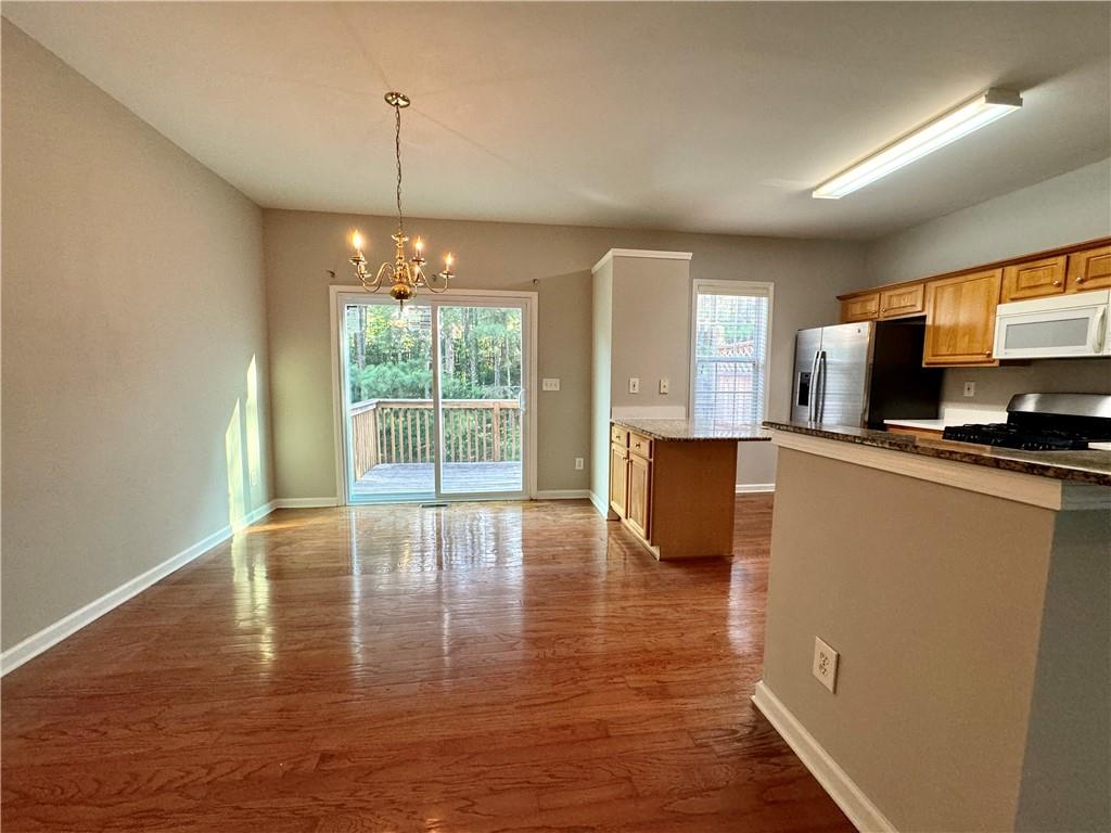 3980 Howell Park Road Duluth, GA 30096 - Photo 14 of 34 a living room with furniture and a flat screen tv